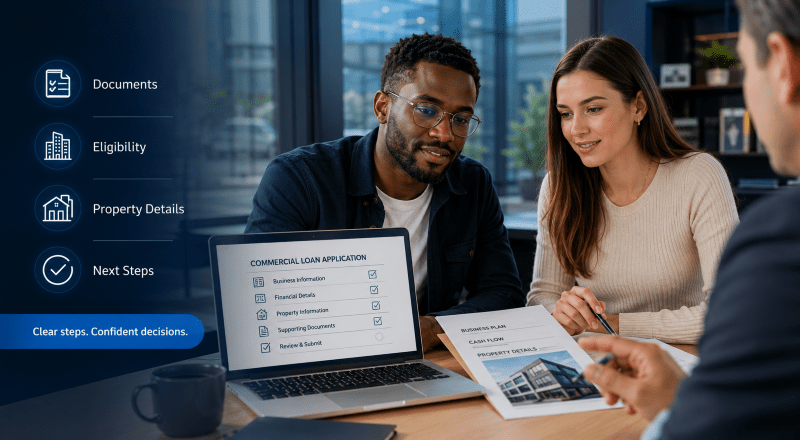 Commercial loan application process with a young mixed couple reviewing documents, eligibility, property details and next steps with an adviser