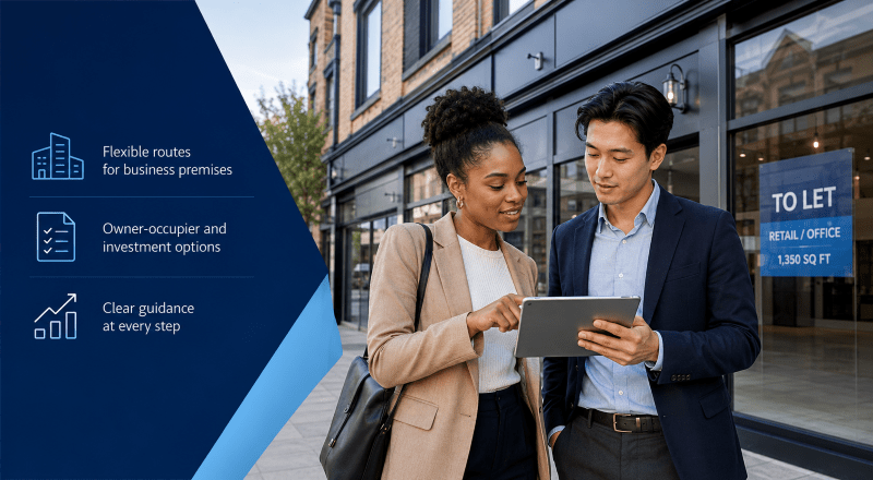 Commercial First Mortgages adviser support for a young mixed couple reviewing finance options outside a retail and office commercial property.