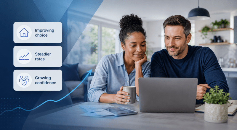Mixed couple reviewing mortgage options on a laptop with icons showing improving choice, steadier rates and growing confidence in the UK mortgage market.