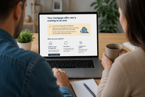 Homeowners reviewing remortgage options on a laptop before their mortgage offer rate comes to an end