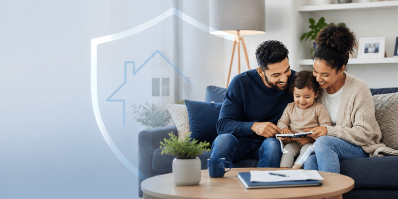 Term Life Insurance UK hero image showing a family at home with a subtle protection shield and house symbol, representing life cover, mortgage protection and financial security.